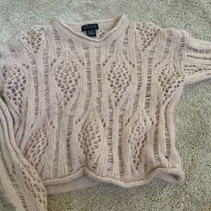 Cropped vintage looking pink sweater